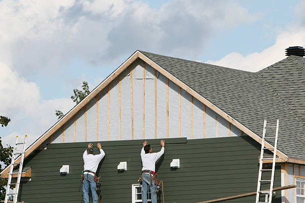 Professional Siding Installation technician working in Loysburg, PA
